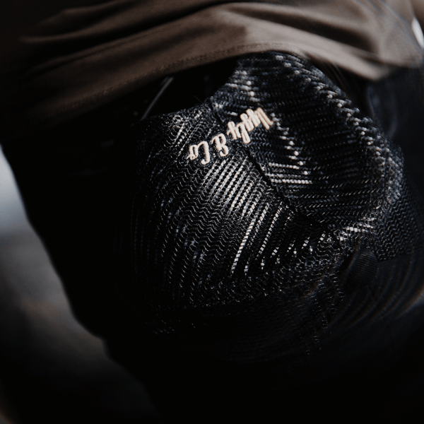 Black Flat Track Trucker Hat